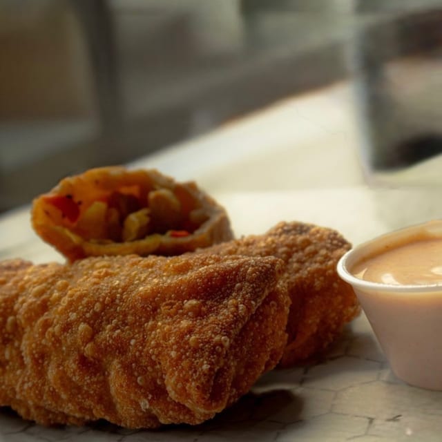 One (1) Veggie Egg Roll.